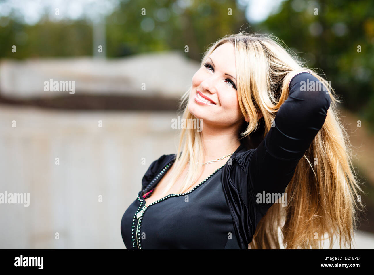 Blond woman`s outdoor portrait. Stock Photo